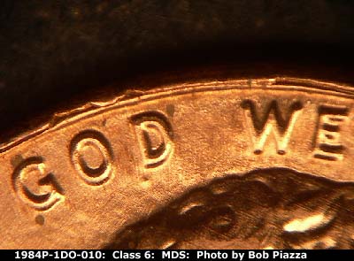 Die-stage B marker on 1984P•1DO•010 (1984 Doubled Die Obverse).