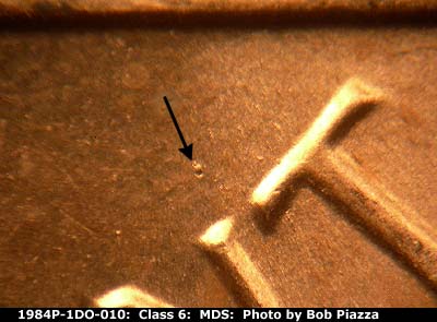 Die-stage B marker on 1984P•1DO•010 (1984 Doubled Die Obverse).