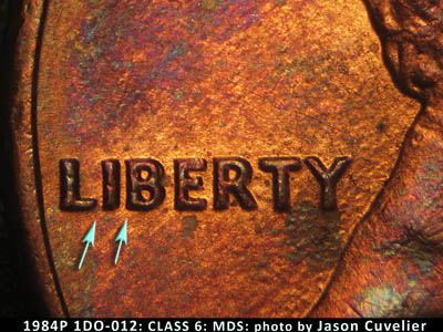 Die-stage B marker on 1984P•1DO•012 (1984 Doubled Die Obverse).
