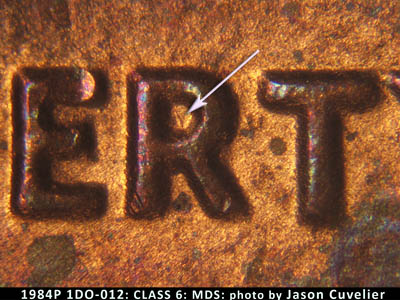 Die-stage B marker on 1984P•1DO•012 (1984 Doubled Die Obverse).