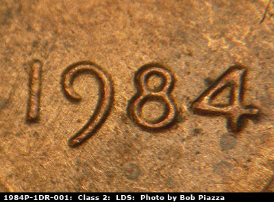 Die-stage C marker on 1984P•1DR•001 (1984 Doubled Die Reverse).