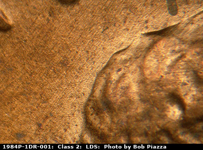 Die-stage C marker on 1984P•1DR•001 (1984 Doubled Die Reverse).
