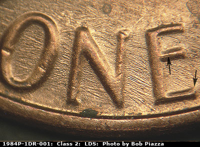 Die-stage C marker on 1984P•1DR•001 (1984 Doubled Die Reverse).