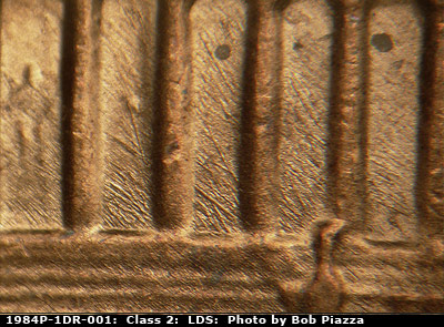 Die-stage C marker on 1984P•1DR•001 (1984 Doubled Die Reverse).