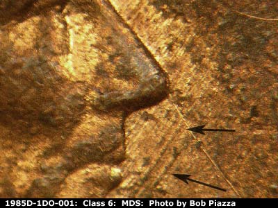Die-stage B marker on 1985D•1DO•001 (1985 Doubled Die Obverse).