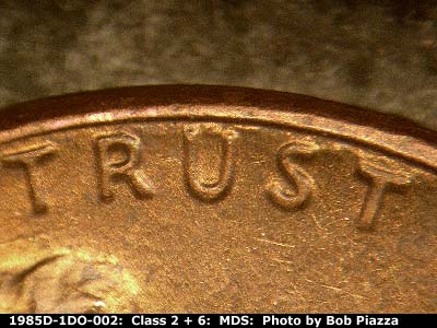 Die-stage B marker on 1985D•1DO•002 (1985 Doubled Die Obverse).