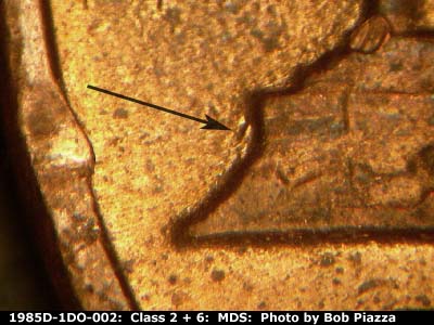 Die-stage B marker on 1985D•1DO•002 (1985 Doubled Die Obverse).