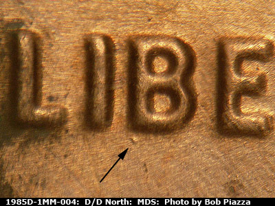 Die-stage B marker on 1985D•1MM•004 (1985 Repunched Mint Mark).