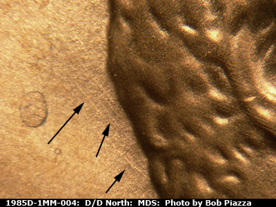 Die-stage B marker on 1985D•1MM•004 (1985 Repunched Mint Mark).