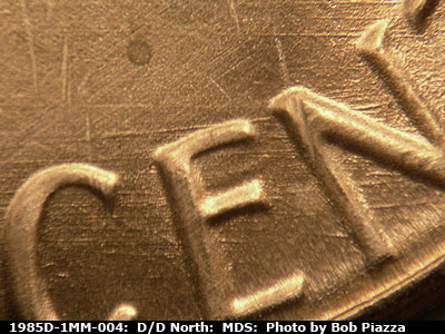 Die-stage B marker on 1985D•1MM•004 (1985 Repunched Mint Mark).