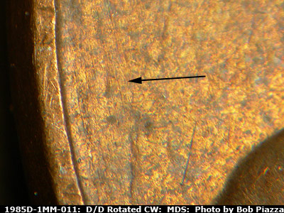 Die-stage B marker on 1985D•1MM•011 (1985 Repunched Mint Mark).