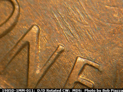 Die-stage B marker on 1985D•1MM•011 (1985 Repunched Mint Mark).