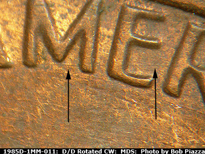 Die-stage B marker on 1985D•1MM•011 (1985 Repunched Mint Mark).