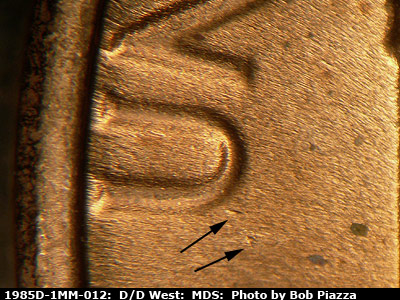 Die-stage B marker on 1985D•1MM•012 (1985 Repunched Mint Mark).