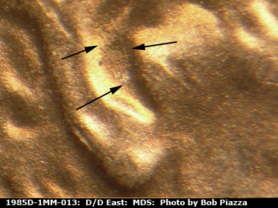 Die-stage B marker on 1985D•1MM•013 (1985 Repunched Mint Mark).