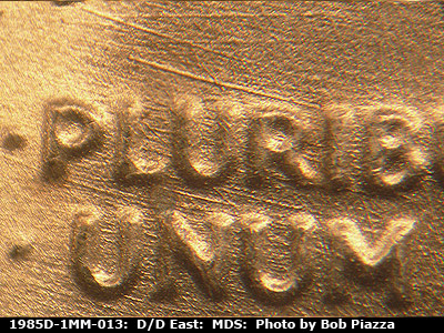 Die-stage B marker on 1985D•1MM•013 (1985 Repunched Mint Mark).