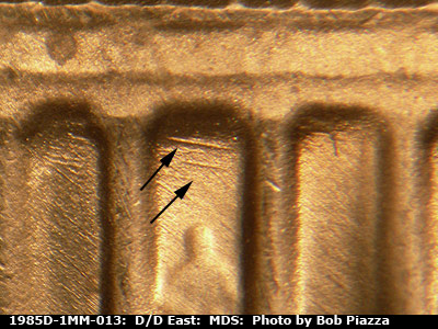 Die-stage B marker on 1985D•1MM•013 (1985 Repunched Mint Mark).