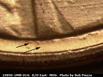 Die-stage B marker on 1985D•1MM•014 (1985 Repunched Mint Mark).