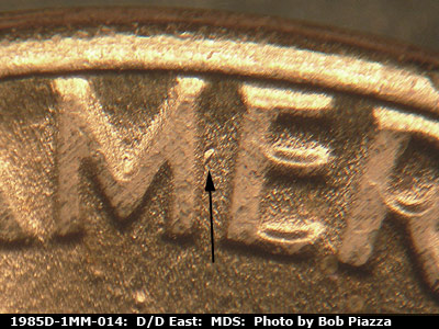 Die-stage B marker on 1985D•1MM•014 (1985 Repunched Mint Mark).