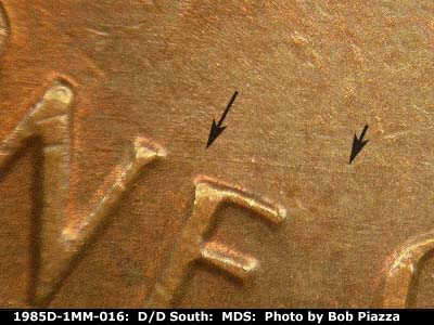 Die-stage B marker on 1985D•1MM•016 (1985 Repunched Mint Mark).