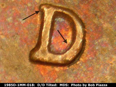 Die-stage B marker on 1985D•1MM•018 (1985 Repunched Mint Mark).