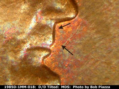 Die-stage B marker on 1985D•1MM•018 (1985 Repunched Mint Mark).