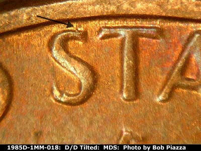 Die-stage B marker on 1985D•1MM•018 (1985 Repunched Mint Mark).