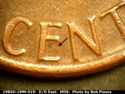 Die-stage B marker on 1985D•1MM•019 (1985 Repunched Mint Mark).