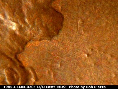 Die-stage B marker on 1985D•1MM•020 (1985 Repunched Mint Mark).