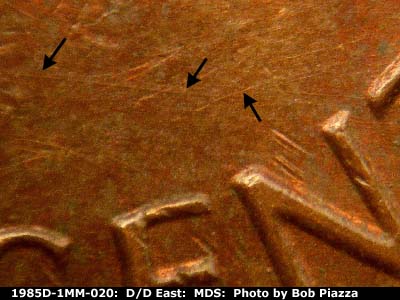 Die-stage B marker on 1985D•1MM•020 (1985 Repunched Mint Mark).