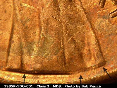 Die-stage B marker on 1985P•1DO•001 (1985 Doubled Die Obverse).