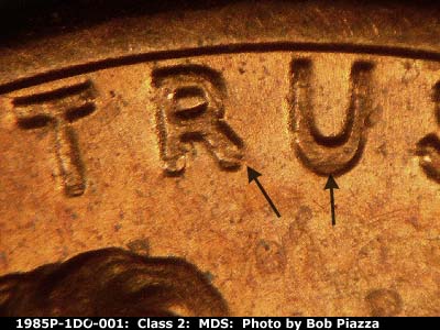 Die-stage B marker on 1985P•1DO•001 (1985 Doubled Die Obverse).