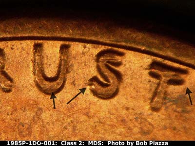 Die-stage B marker on 1985P•1DO•001 (1985 Doubled Die Obverse).