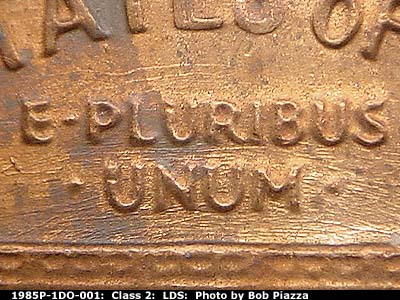 Die-stage C marker on 1985P•1DO•001 (1985 Doubled Die Obverse).
