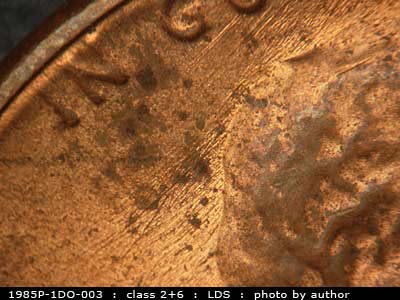 Die-stage C marker on 1985P•1DO•003 (1985 Doubled Die Obverse).