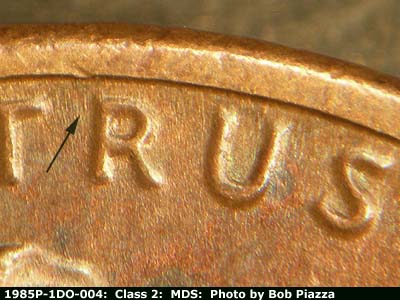 Die-stage B marker on 1985P•1DO•004 (1985 Doubled Die Obverse).