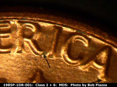 Die-stage B marker on 1985P•1DR•001 (1985 Doubled Die Reverse).