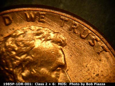 Die-stage B marker on 1985P•1DR•001 (1985 Doubled Die Reverse).