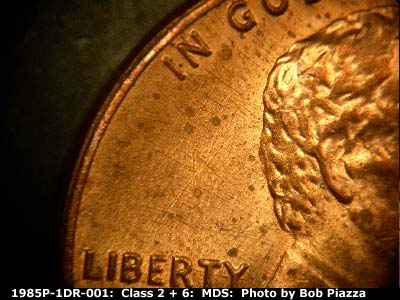 Die-stage B marker on 1985P•1DR•001 (1985 Doubled Die Reverse).