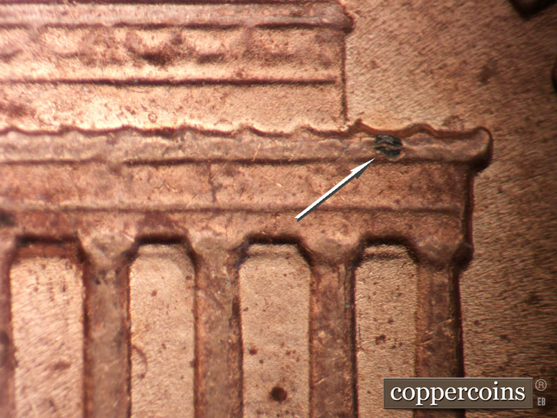 Die-stage B marker on 1986D•1MM•001 (1986 Repunched Mint Mark).