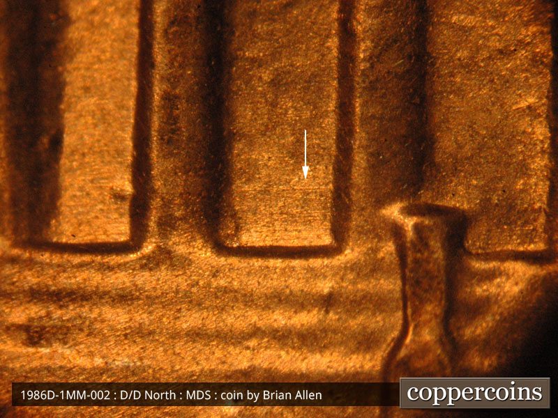 Die-stage B marker on 1986D•1MM•002 (1986 Repunched Mint Mark).