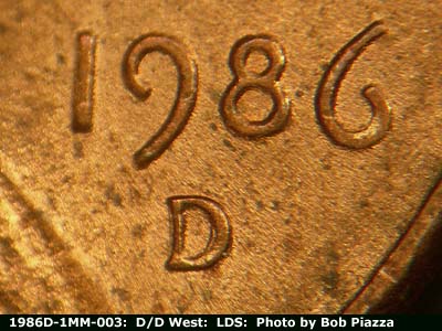 Die-stage C marker on 1986D•1MM•003 (1986 Repunched Mint Mark).