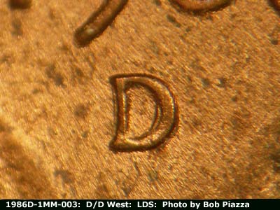 Die-stage C marker on 1986D•1MM•003 (1986 Repunched Mint Mark).