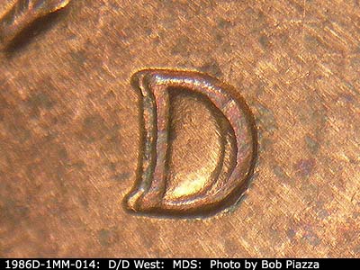 Die-stage B marker on 1986D•1MM•014 (1986 Repunched Mint Mark).