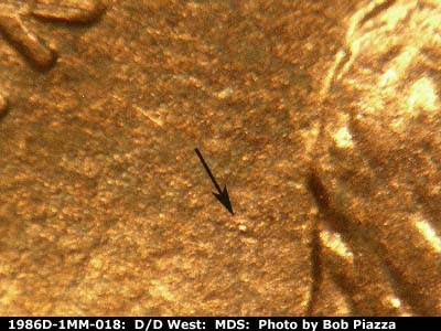 Die-stage B marker on 1986D•1MM•018 (1986 Repunched Mint Mark).