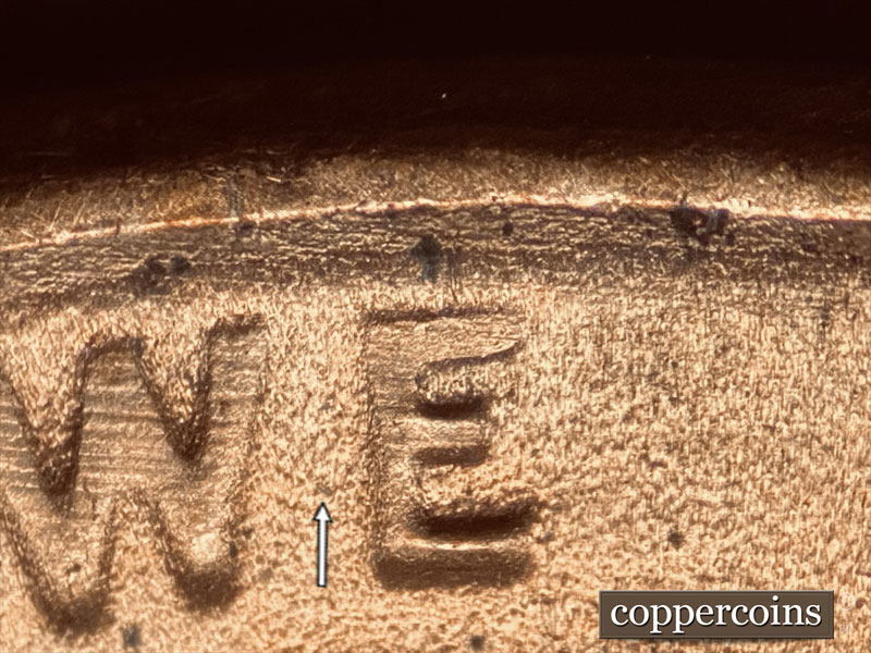 Die-stage B marker on 1986D•1MM•021 (1986 Repunched Mint Mark).