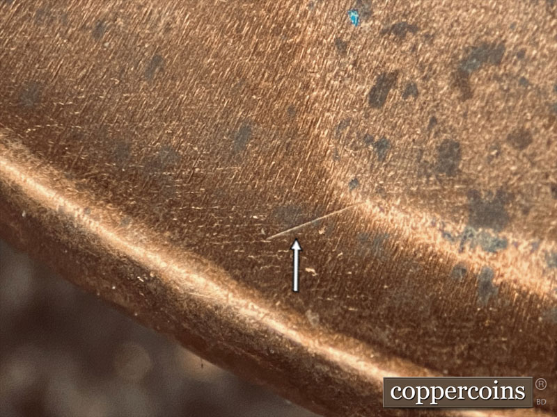 Die-stage B marker on 1986D•1MM•021 (1986 Repunched Mint Mark).