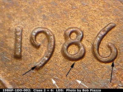 Die-stage C marker on 1986P•1DO•002 (1986 Doubled Die Obverse).