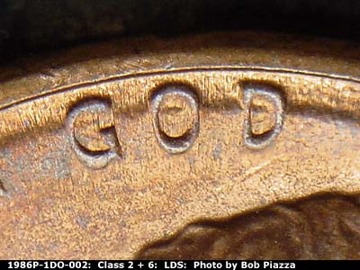 Die-stage C marker on 1986P•1DO•002 (1986 Doubled Die Obverse).