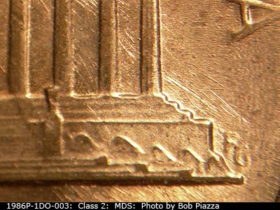 Die-stage B marker on 1986P•1DO•003 (1986 Doubled Die Obverse).